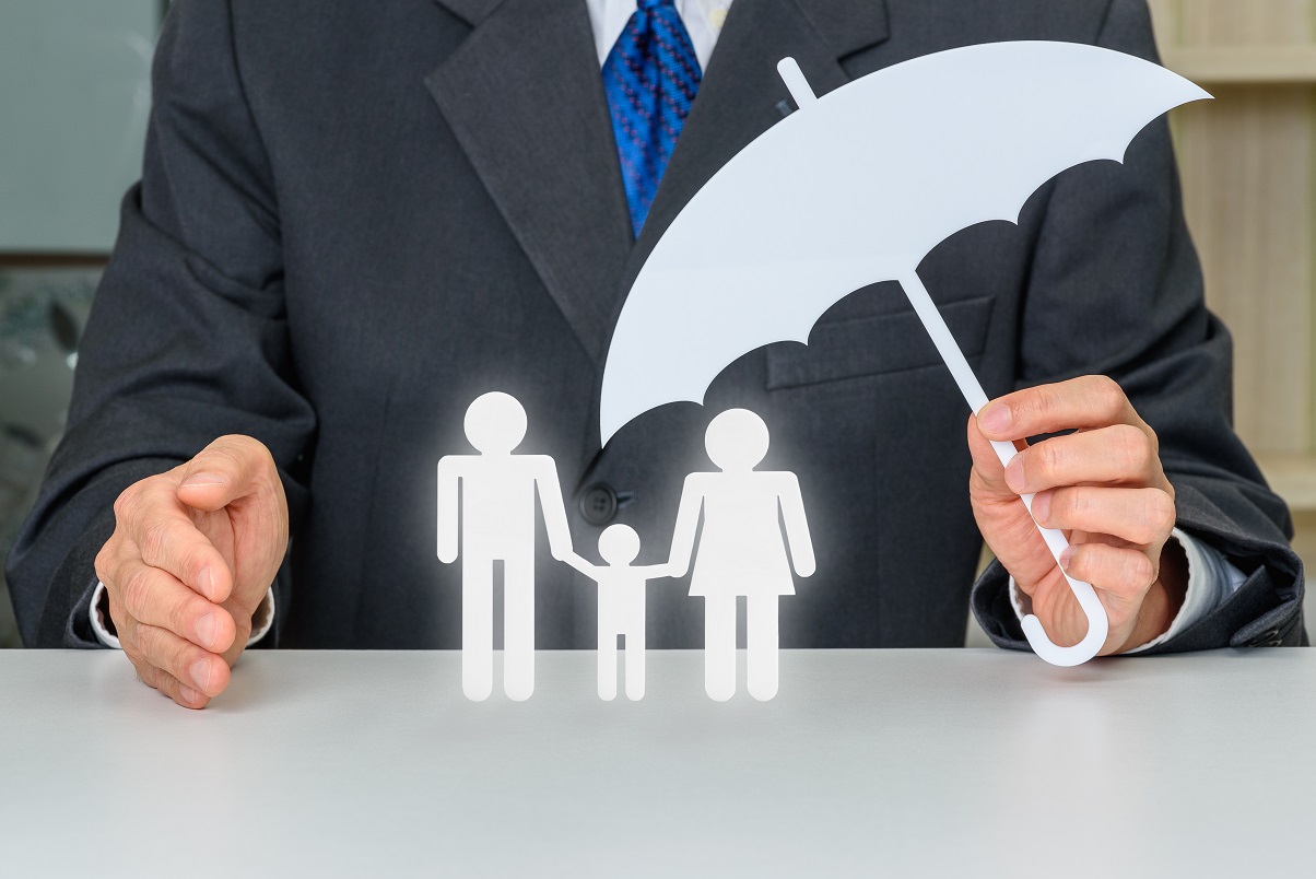 umbrella over family