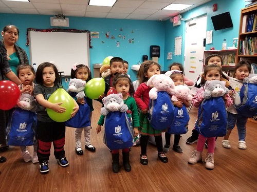 kids holding balloons